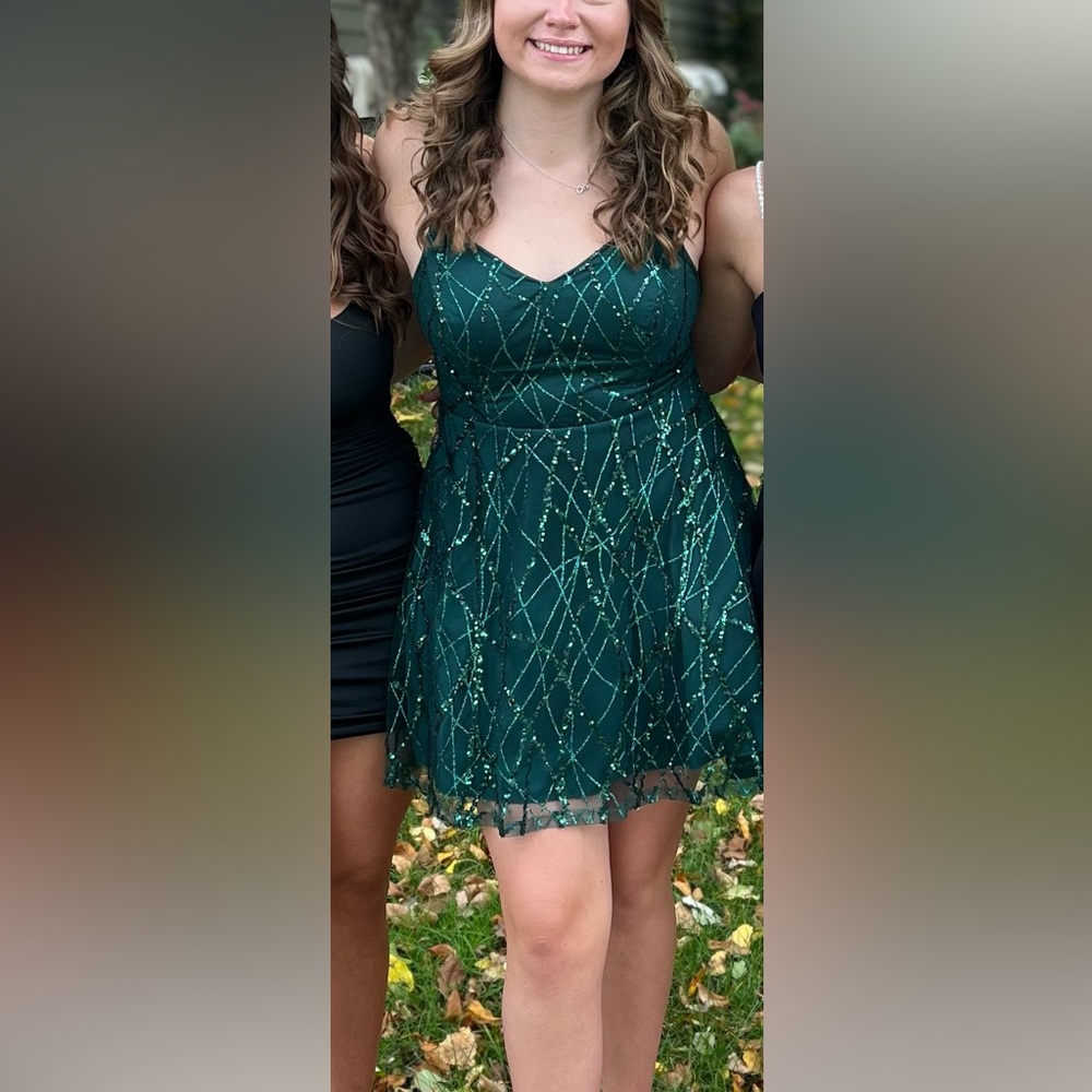 Green above-the-knee-length dress with sequins and spaghetti straps